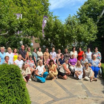 Jubilarissen in het zonnetje tijdens feestelijke borrel